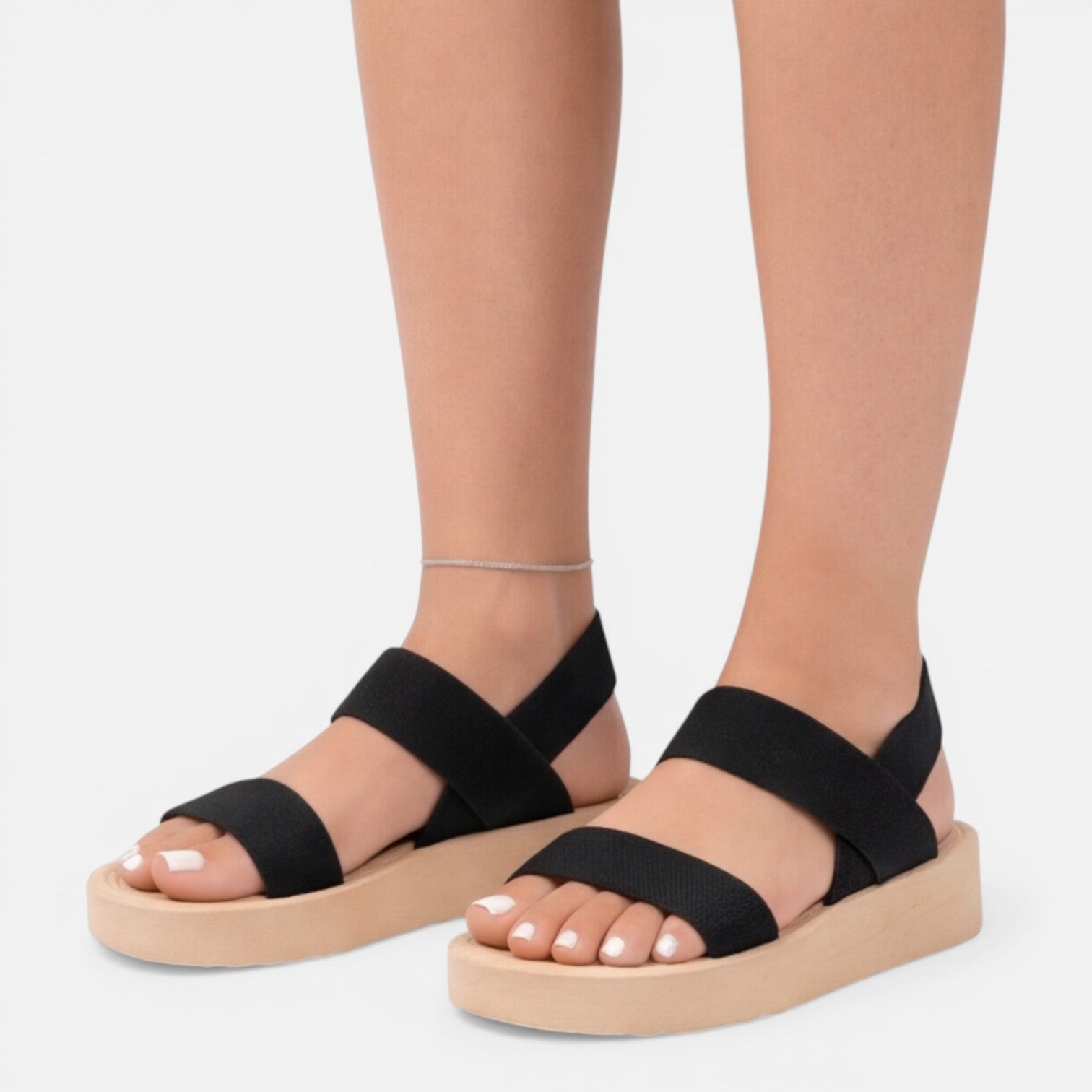 Women’s wedge sandals with open toe, black fabric straps and cushioned platform sole