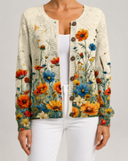 Floral knit cardigan with orange and blue wildflower print, button-front with round buttons.