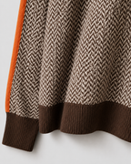 Herringbone knit sweater hem with ribbed cuffs, dark brown contrast band at bottom