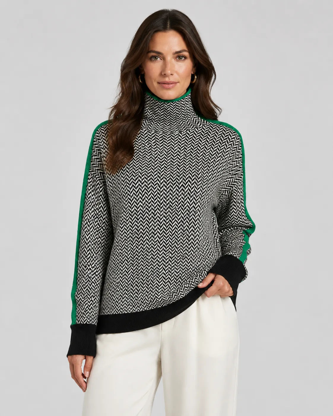 Herringbone knit turtleneck sweater with green contrast sleeves and dark ribbed hem