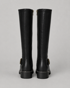 Black knee-high buckle boots with side zip and lug sole, rear pair view.