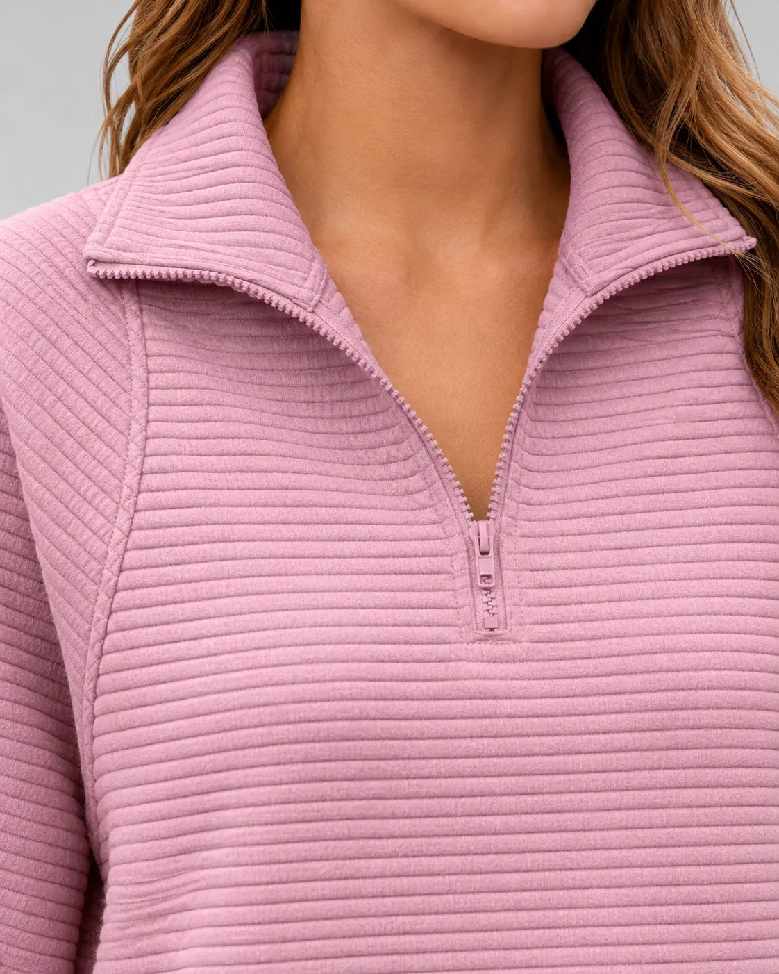 Pink ribbed quarter-zip long sleeve pullover with stand collar and zip front