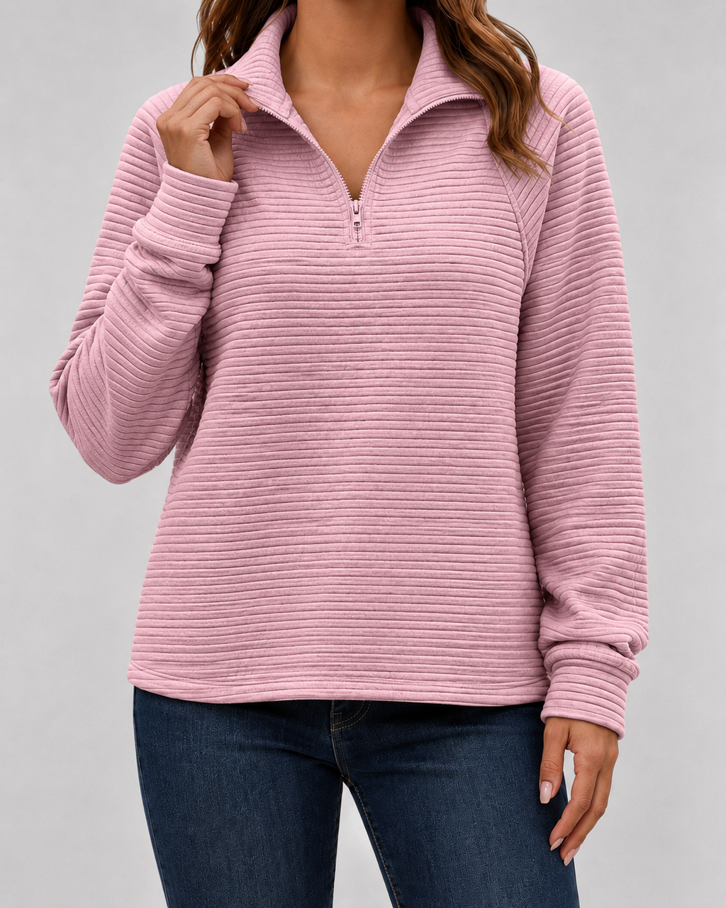 Pink ribbed quarter-zip long sleeve pullover with half-zip closure and collar