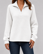White ribbed quarter-zip long sleeve pullover with zip front and stand collar