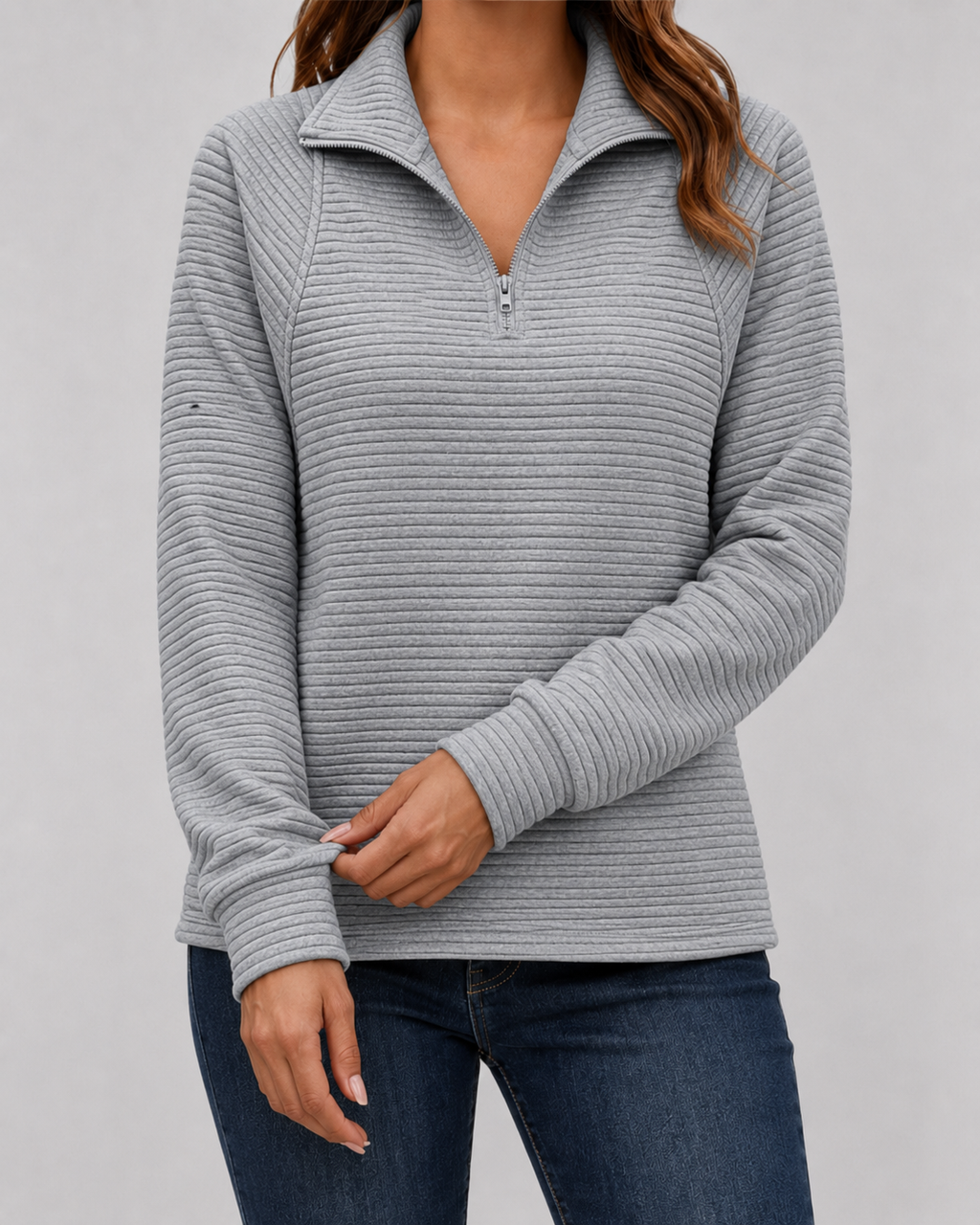 Gray ribbed quarter-zip long sleeve pullover with half-zip closure and collar