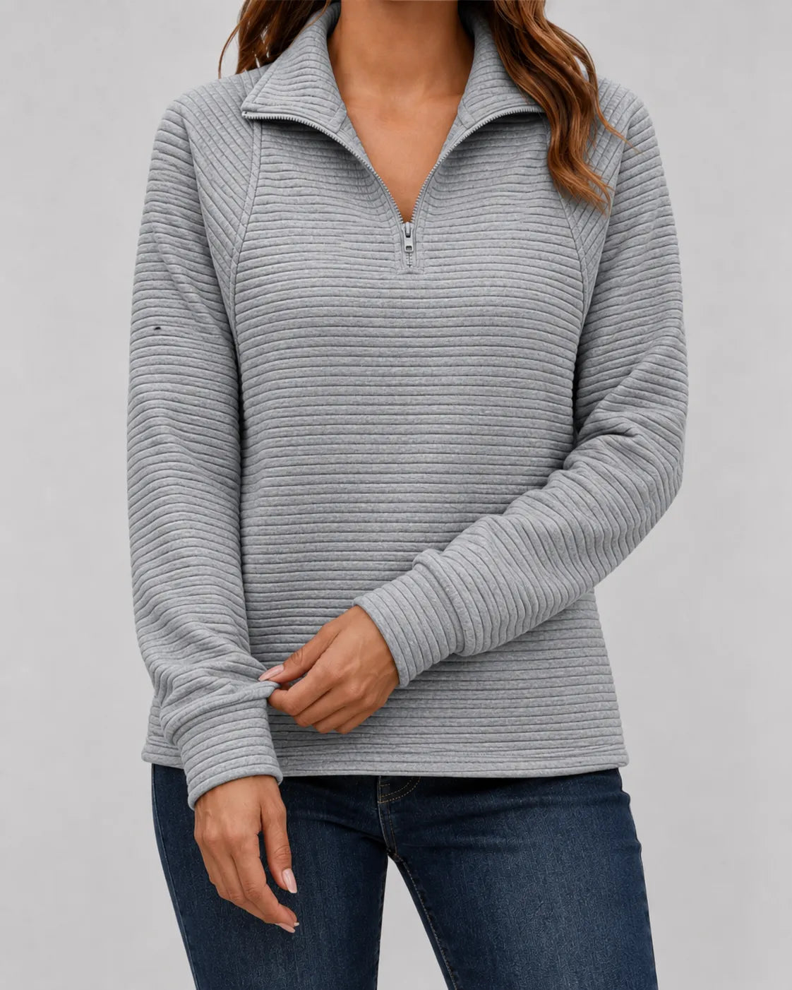Gray ribbed quarter-zip long sleeve pullover with half-zip closure and collar