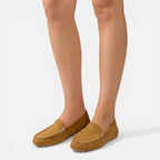 Women’s slip-on loafers in tan suede with gold-tone metal buckle detail