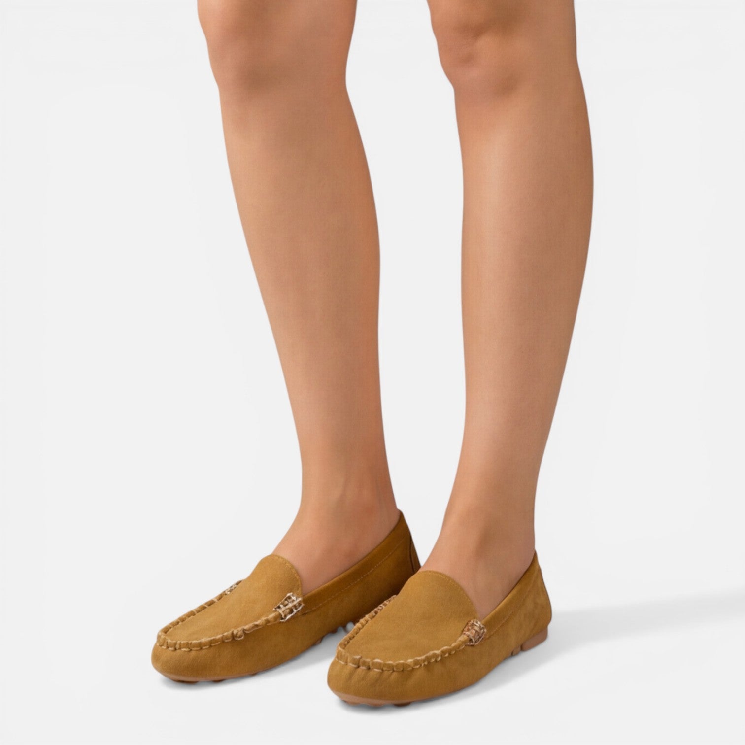 Women’s slip-on loafers in tan suede with gold-tone metal buckle detail