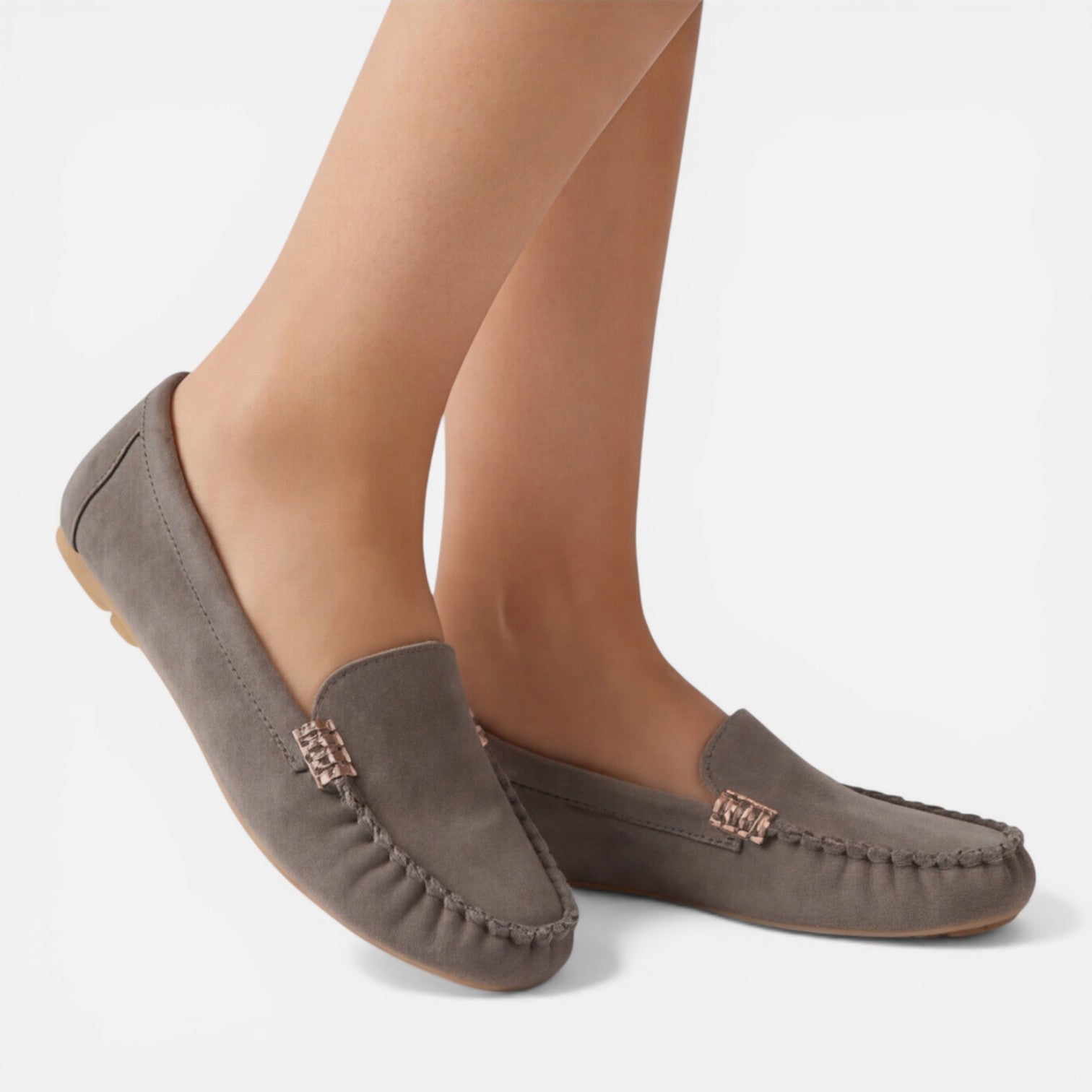 Women’s slip-on loafers in gray suede with gold-tone metal buckle and stitched moc