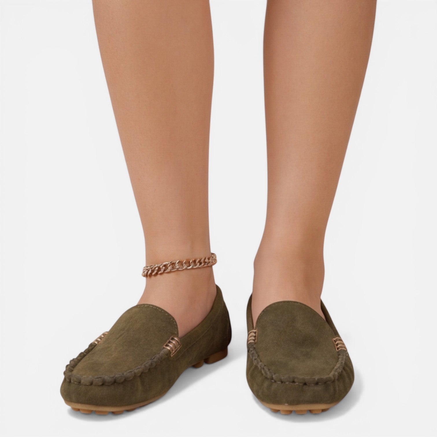 Women’s slip-on loafers in dark green suede with gold-tone metal buckle detail