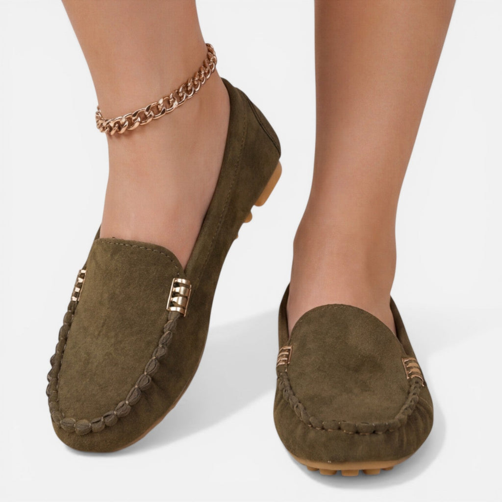 Women’s slip-on loafers in dark green suede with gold-tone metal buckle and tassel trim