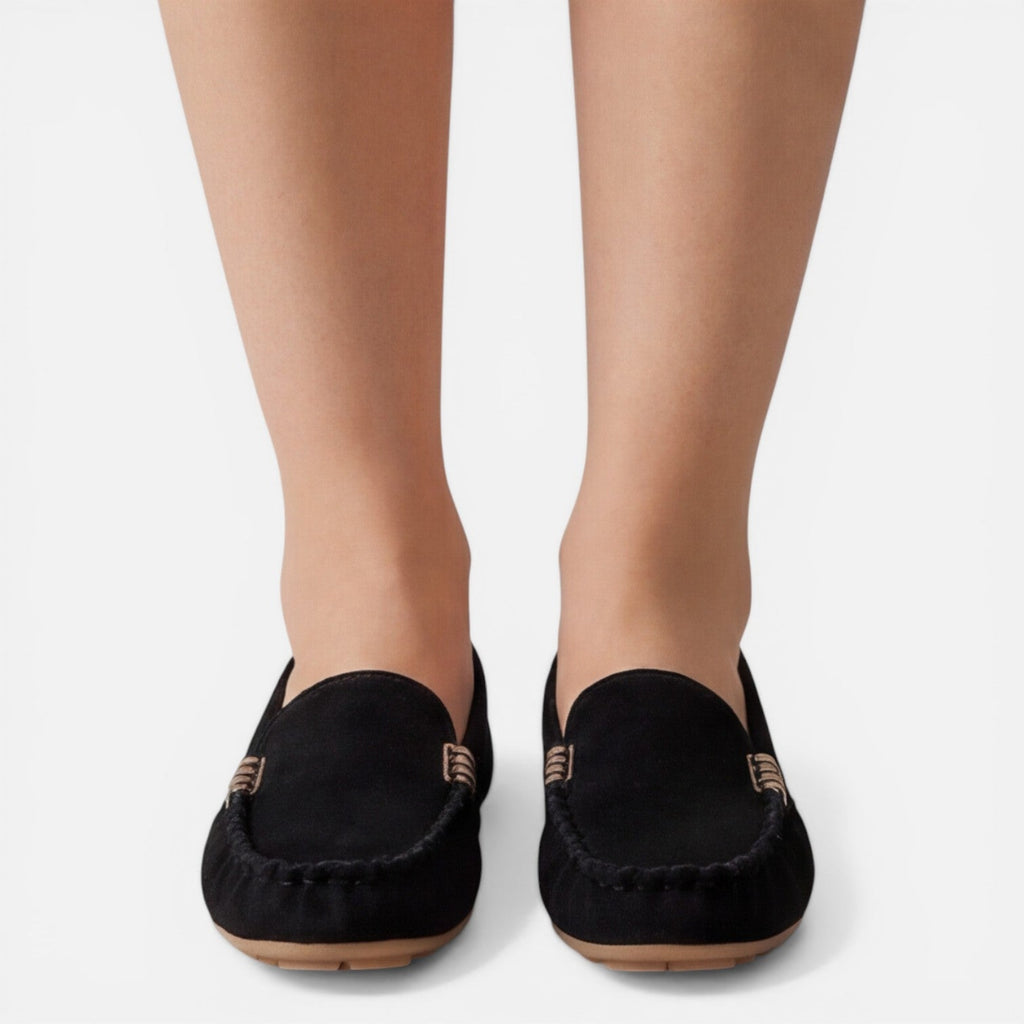 Women’s slip-on loafers in black suede with gold-tone metal buckle and stitched edge