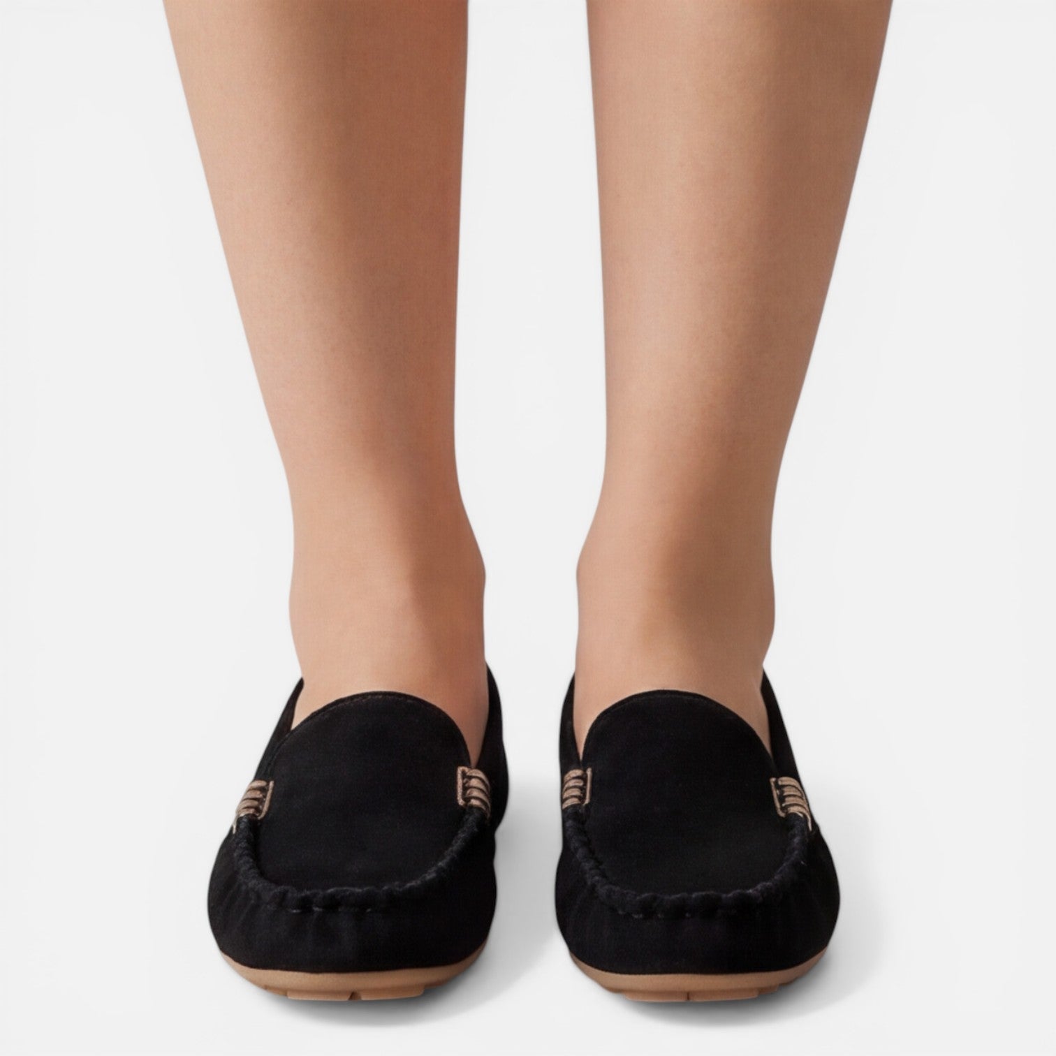 Women’s slip-on loafers in black suede with gold-tone metal buckle and stitched edge