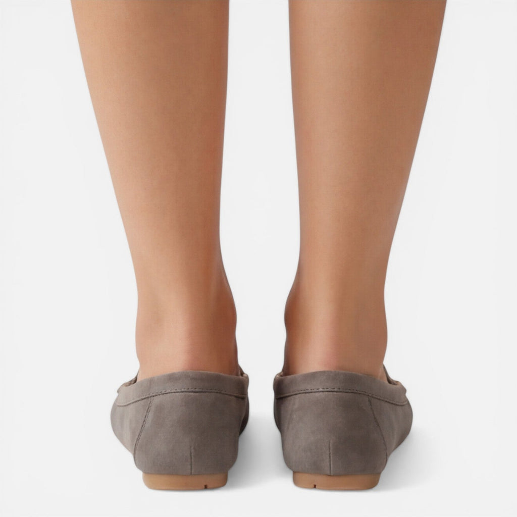 Women’s slip-on loafers in gray suede, back view with flat sole and stitched heel