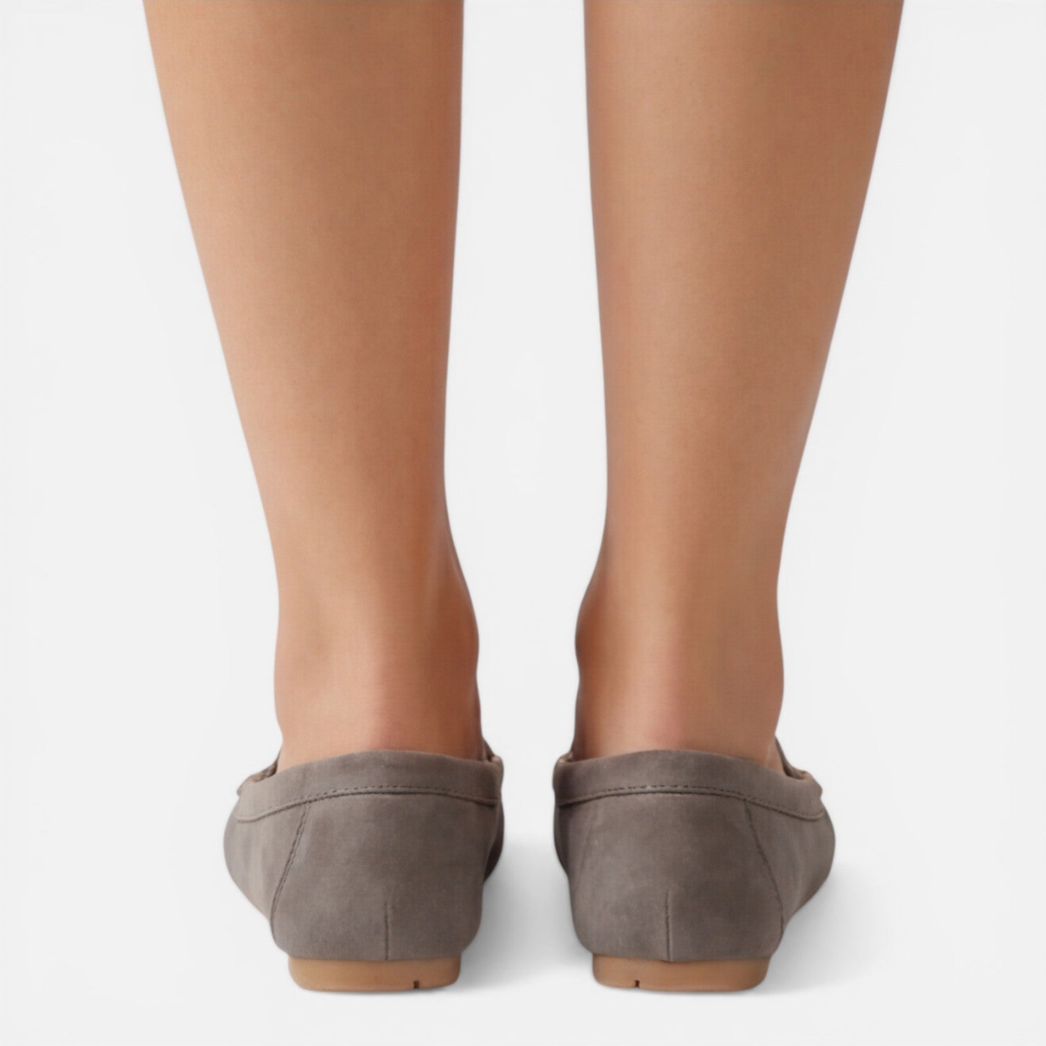 Women’s slip-on loafers in gray suede, back view with flat sole and stitched heel
