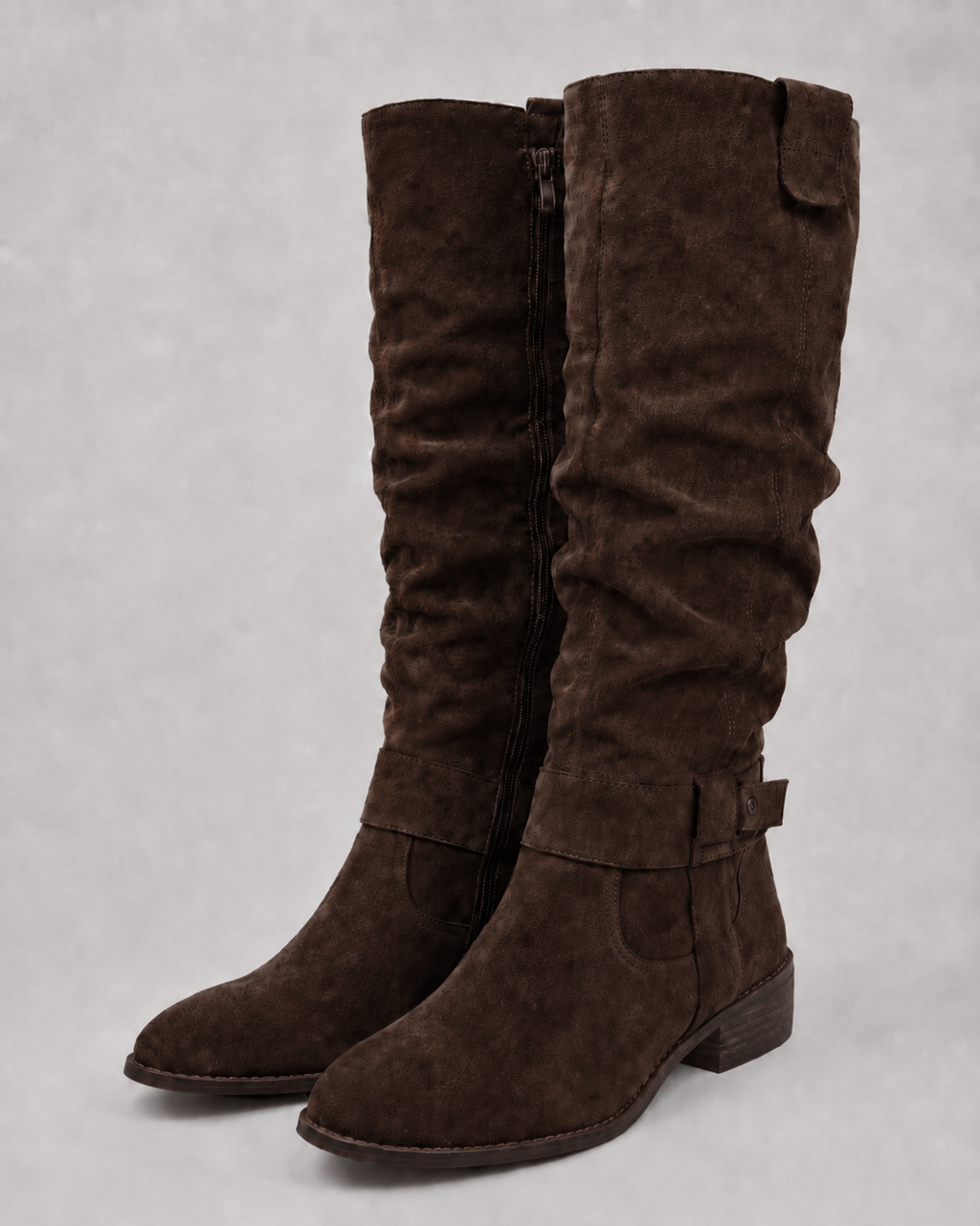 Brown suede knee-high boots with low heel and side zip closure