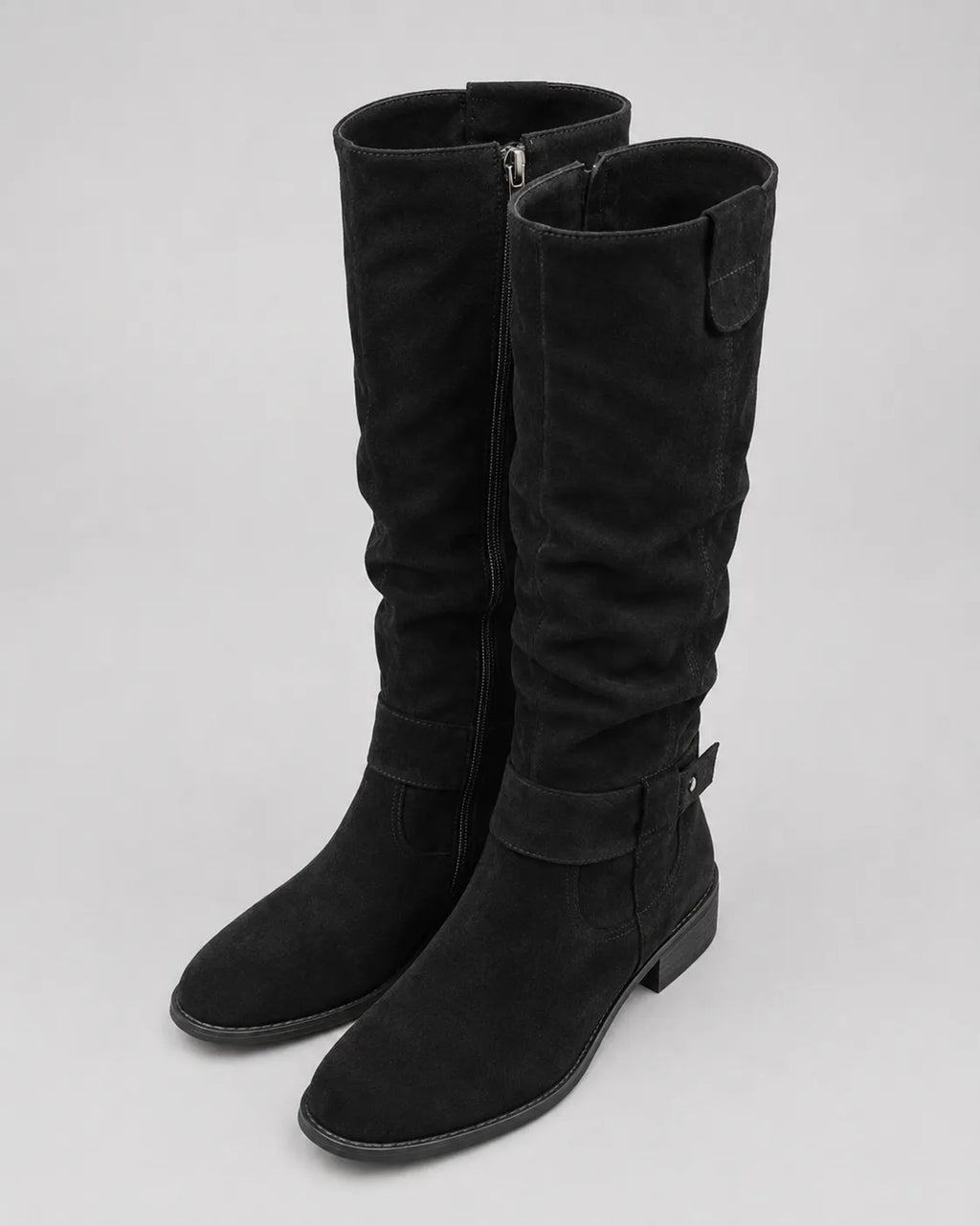 Black suede knee-high boots with side zipper and low block heel, front view
