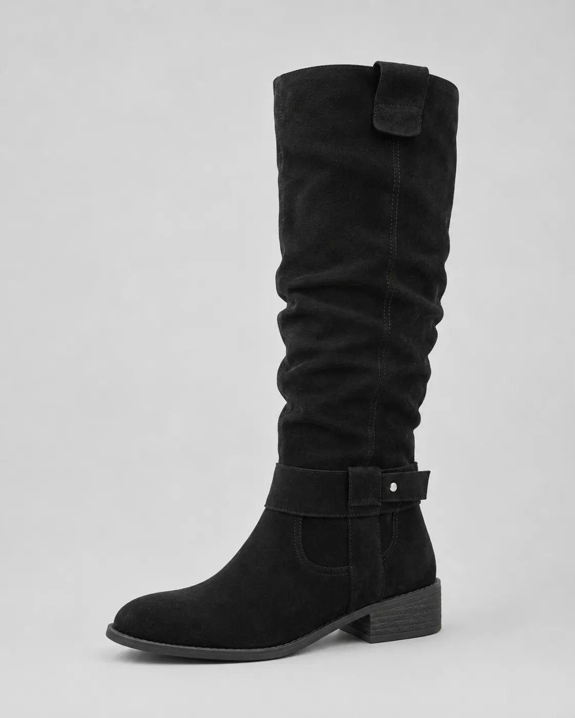 Black suede knee-high boots with side buckle strap and low block heel