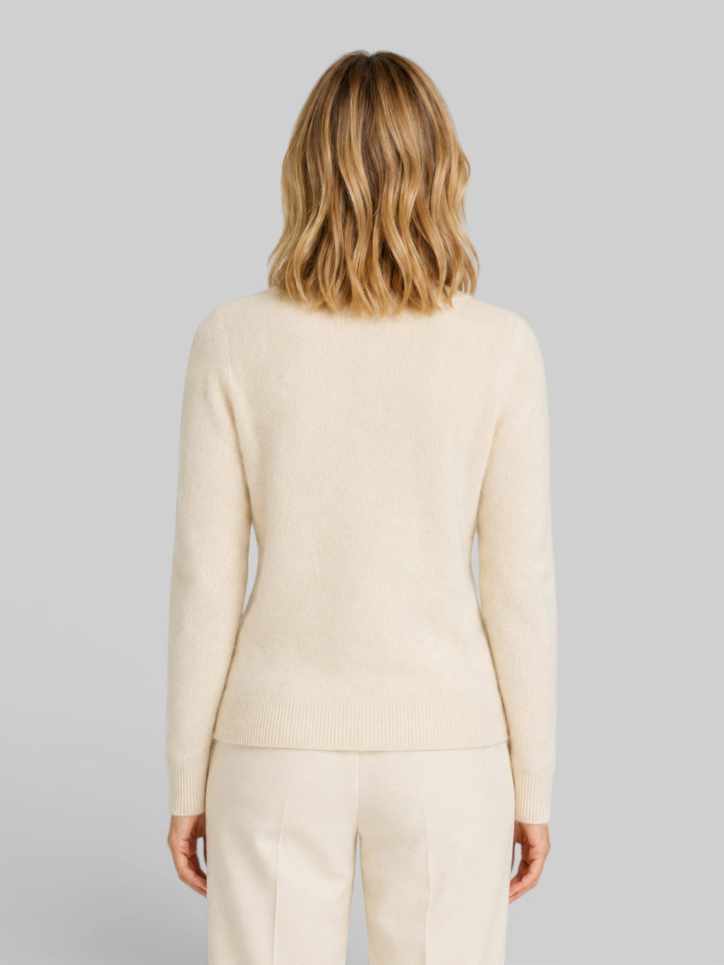 Women's wool knit cardigan, beige, back view, long sleeves