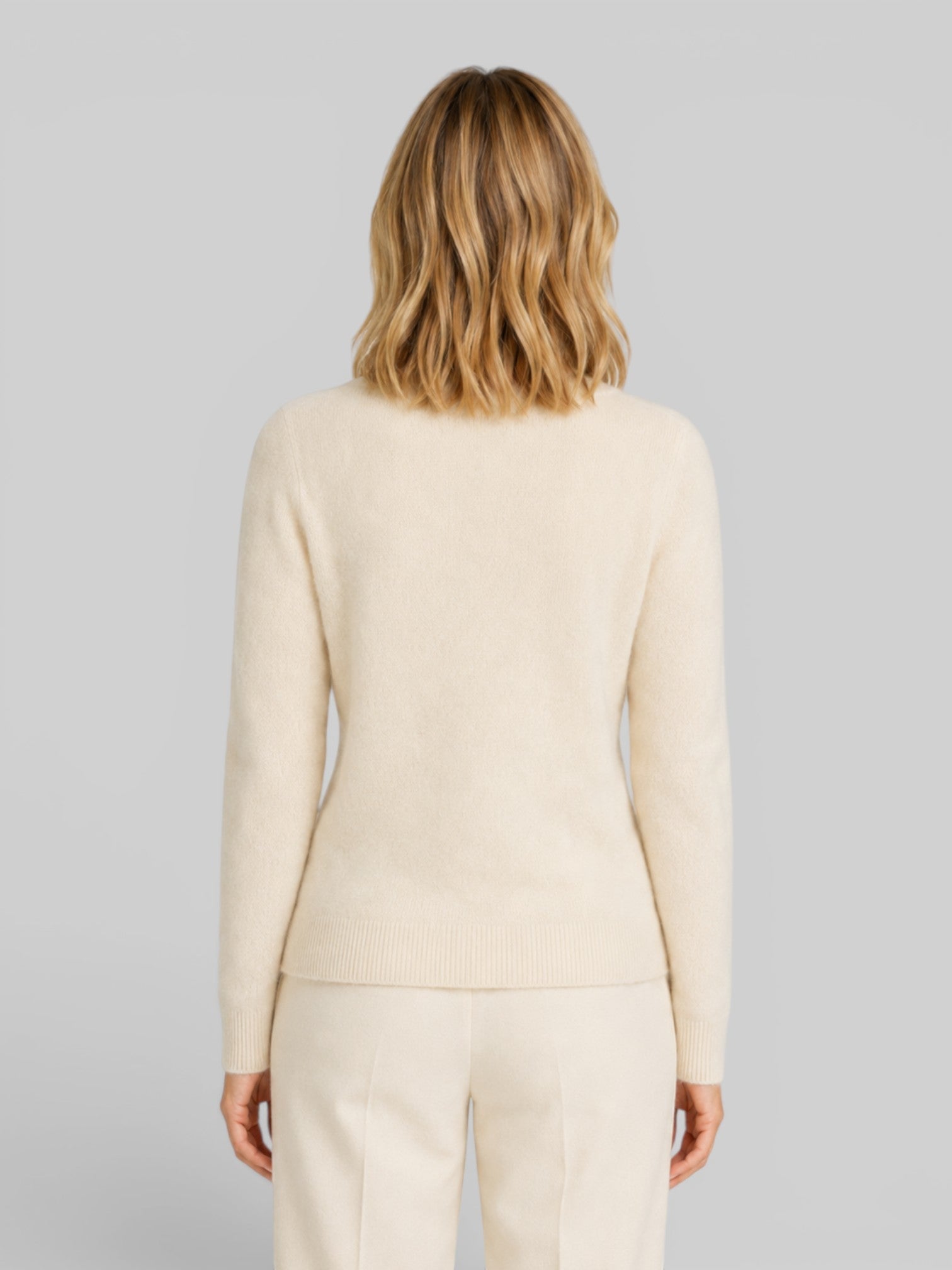 Women's wool knit cardigan, beige, back view, long sleeves