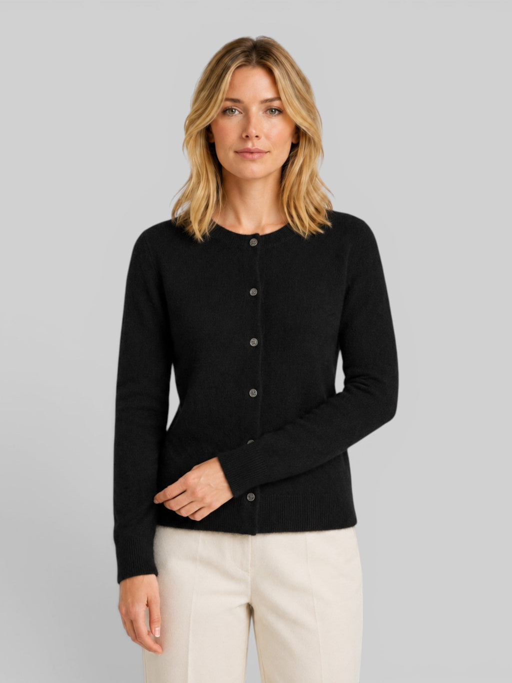 Women's wool knit cardigan, black button-front with long sleeves and relaxed fit