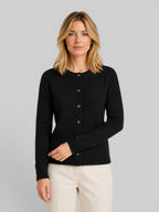 Women's wool knit cardigan, black button-front with long sleeves and relaxed fit