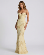 Lemon yellow fitted cocktail dress with gold floral embroidery and narrow shoulder straps