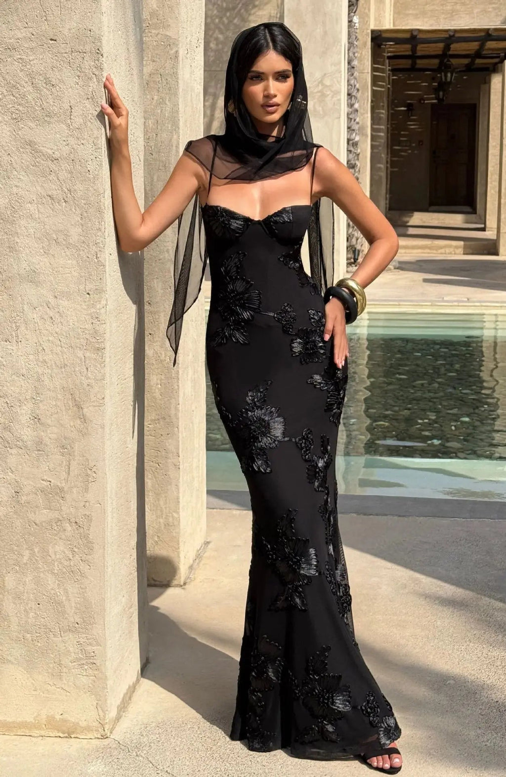 Black backless floral slim-fit cocktail dress with sheer halter straps