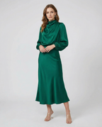 Green satin midi dress with long sleeves, high neckline, and tapered fit