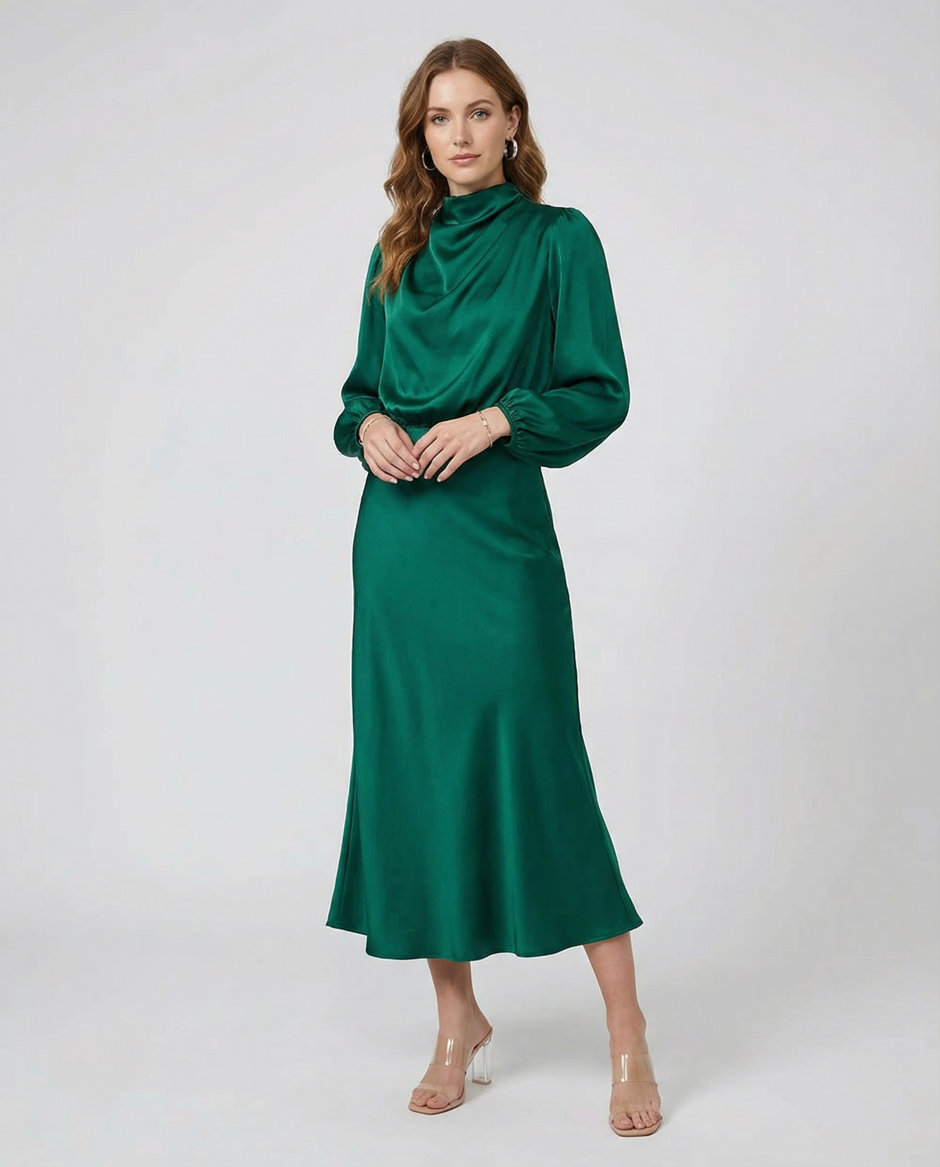 Green satin midi dress with long sleeves, high neckline, and tapered fit