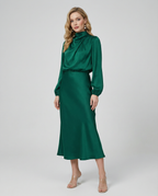 Dark green satin midi dress with long balloon sleeves, high neck, and waist seam