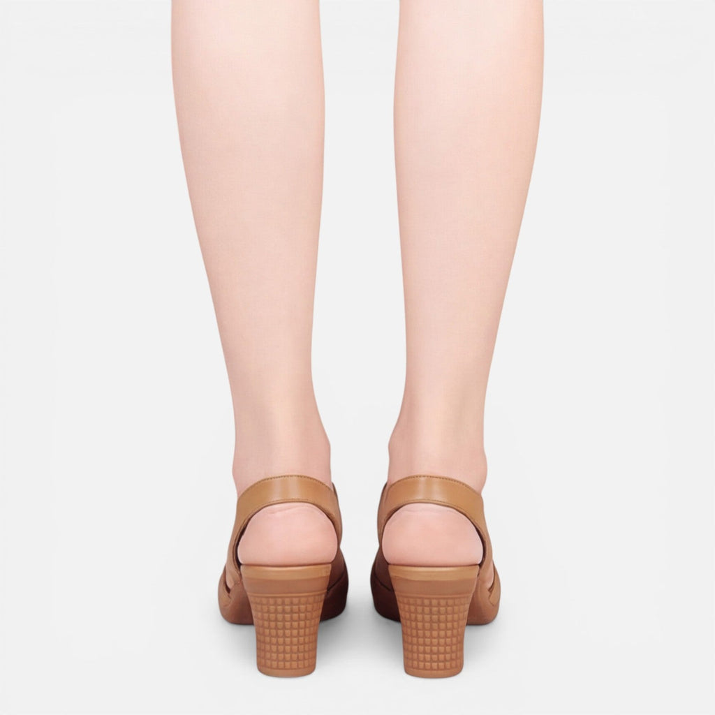 Women’s tan block-heel sandals with open toe, back view of heels
