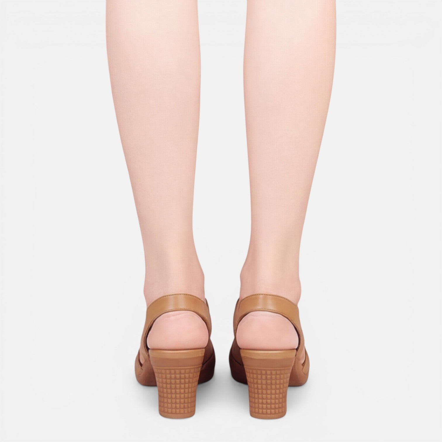 Women’s tan block-heel sandals with open toe, back view of heels