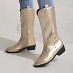 Gold cowboy boots with western embroidery and block heel, pointed toe