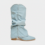 Light blue denim knee-high boots with fold-over shaft and pointed toe, flat heel