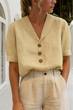Beige linen blouse with shawl collar, short sleeves, button front