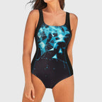 Square-neck one-piece swimsuit, blue abstract crystal print on dark base with straps