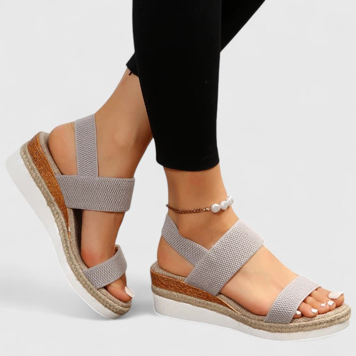 Taupe two-strap platform sandals with open toe and jute trim