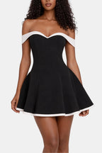 Black off-shoulder mini dress with flared skirt and white trim along neckline and hem