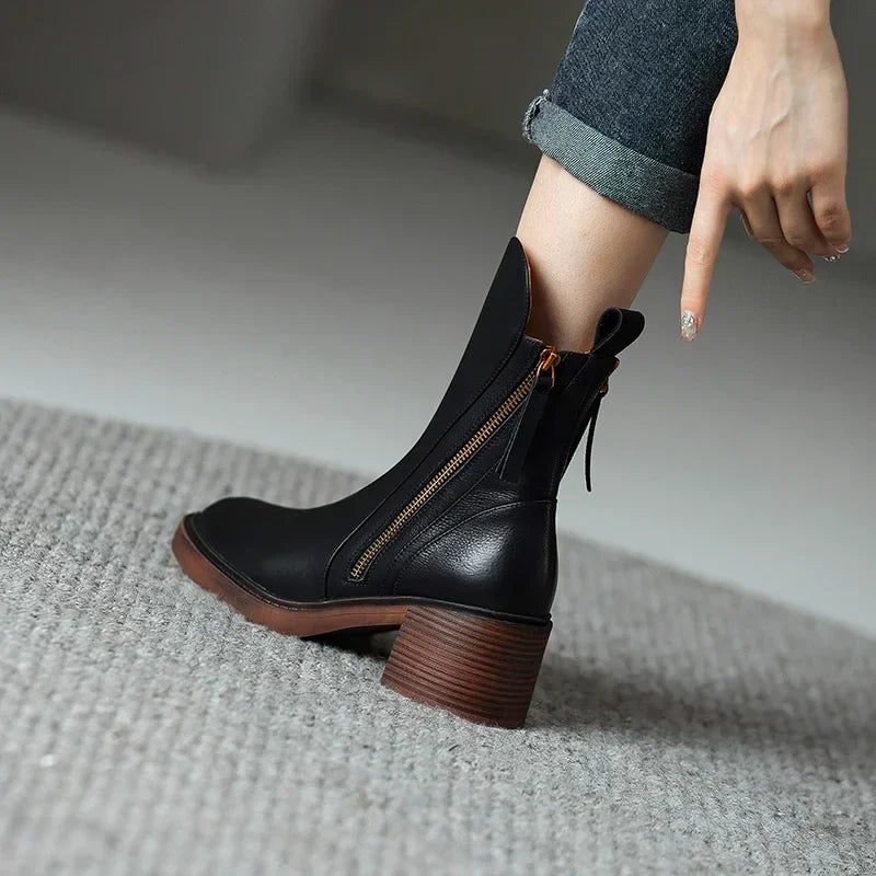 Black ankle boots with block heel and side zipper detail