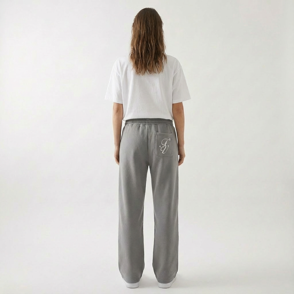 Unisex baggy joggers in gray with elastic waistband, drawstring, and relaxed legs