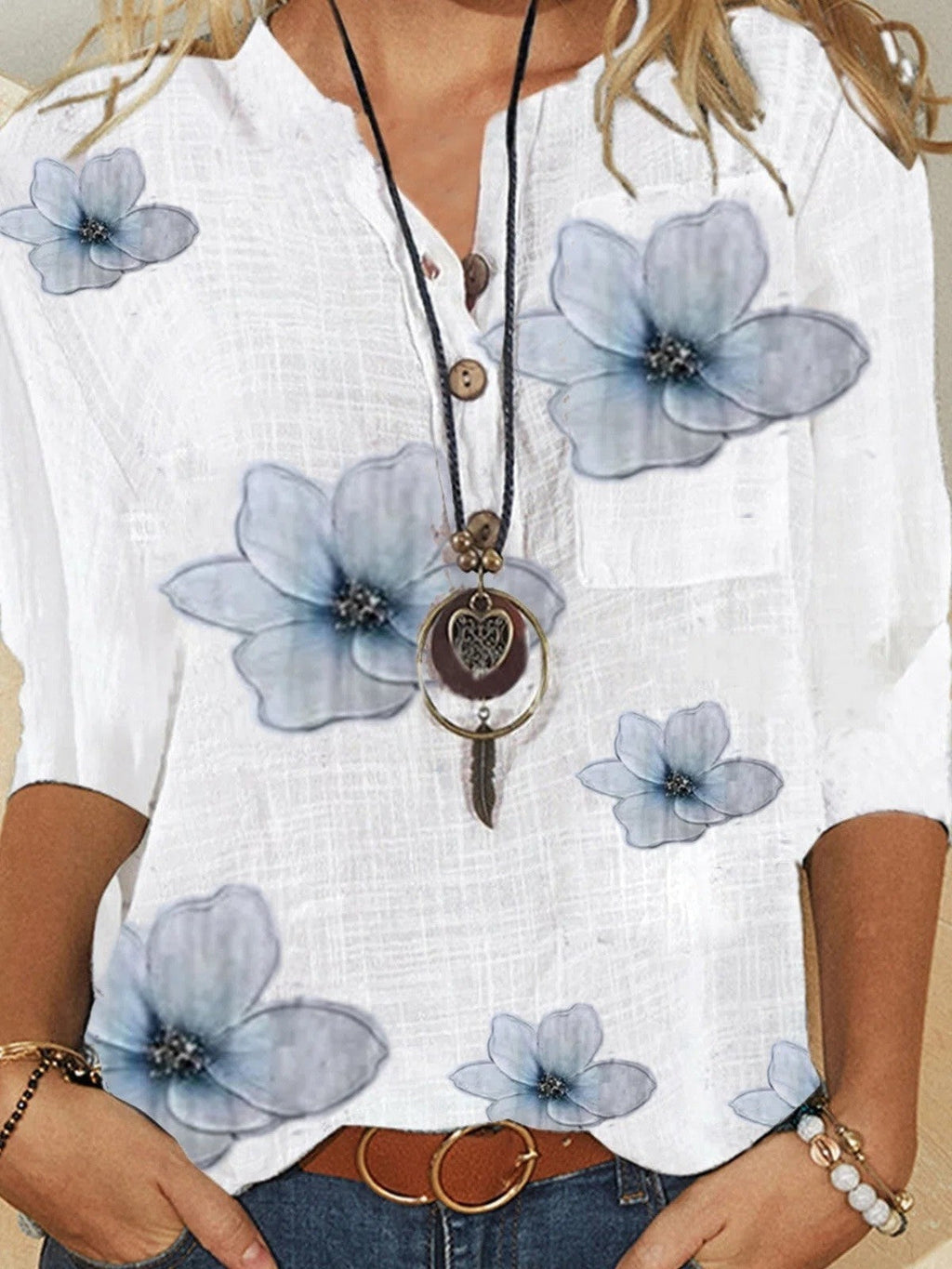 White floral button-front 3/4 sleeve blouse with light blue flower print