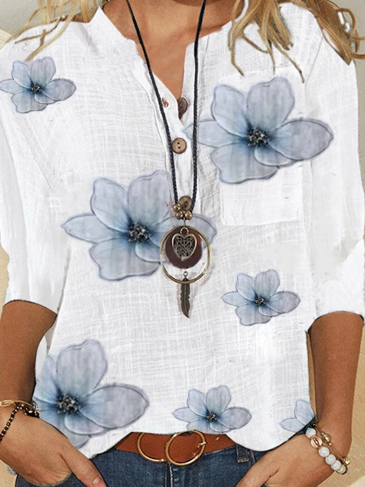 White floral button-front 3/4 sleeve blouse with light blue flower print