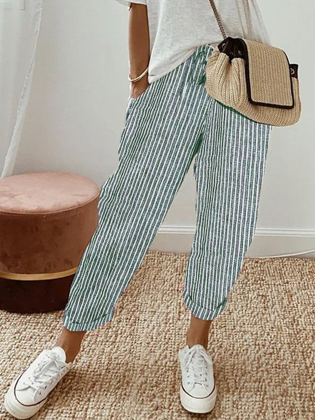 Women’s anti-sweat pants in green pinstripe, cuffed ankle, drawstring waistband