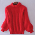 Red loose knit wool sweater with high neck and long wide sleeves