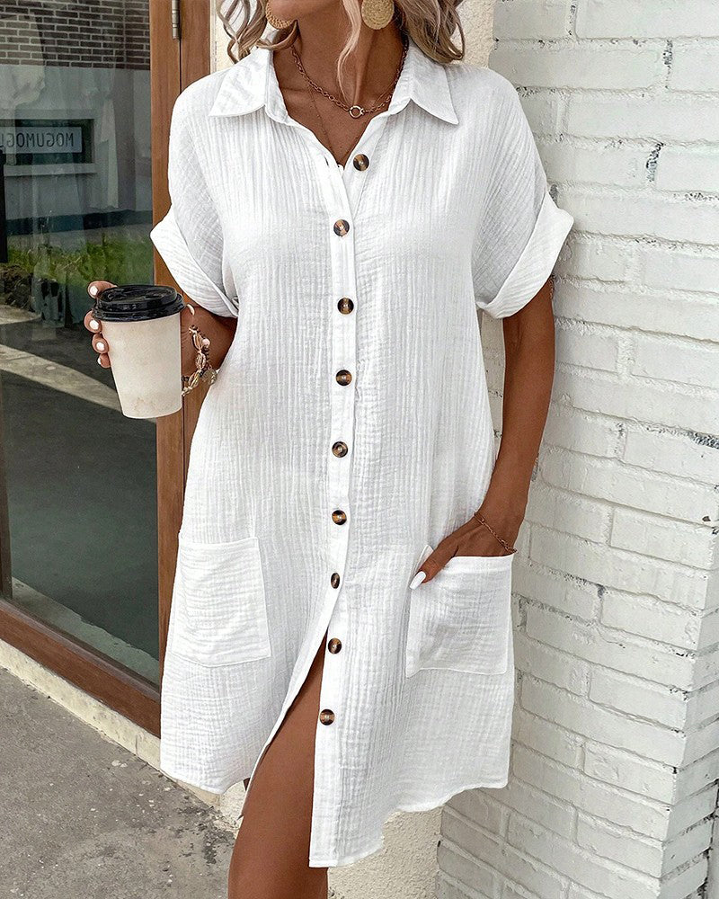 White collared mini button-front pocket dress, side view, short sleeves, buttons
