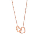 Rose-gold heart pendant necklace with small linked chain, openwork double-heart design
