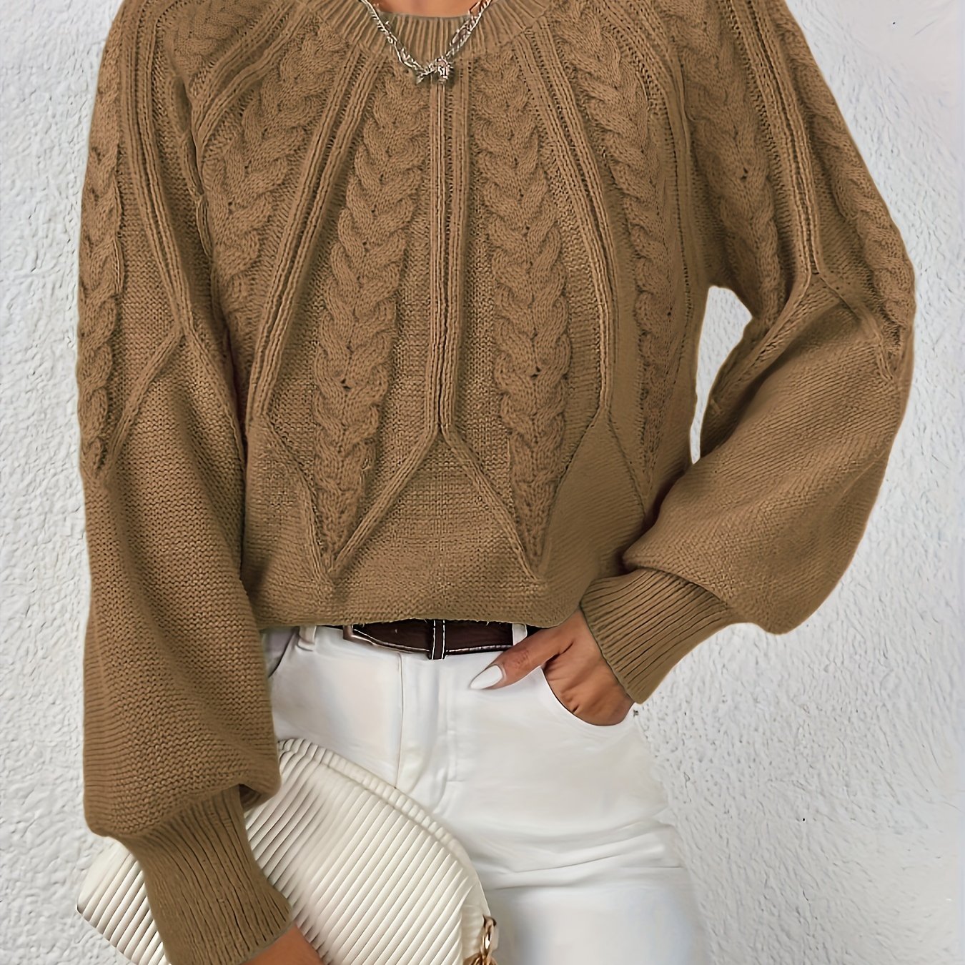 Women’s cable knit sweater with lantern sleeves, earth brown, braided cable pattern front.