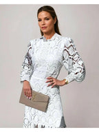 White lace midi dress with high neckline and 3/4 puff sleeves