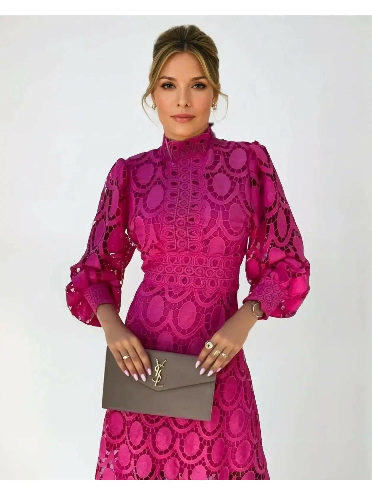 Pink lace midi dress with high neckline and long puff sleeves